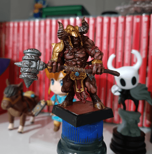 Miniatura pintada à mão pela comunidade.